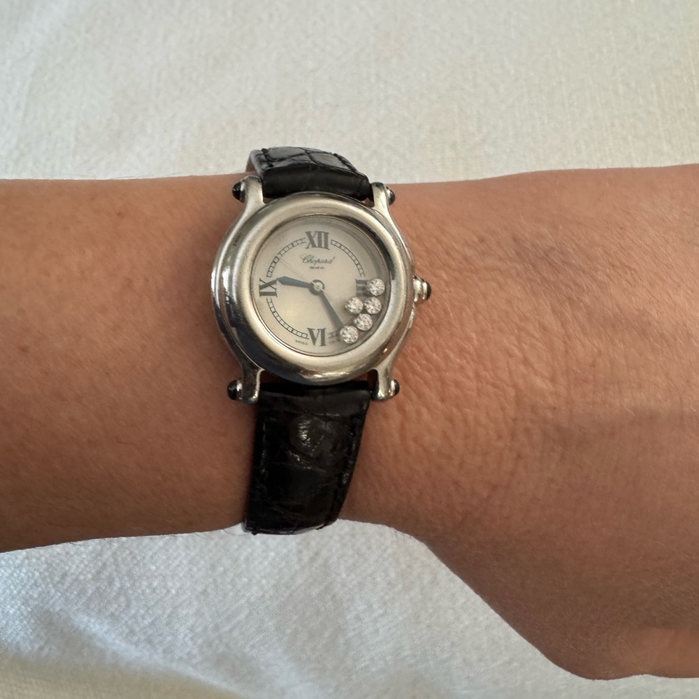 Chopard Silver and Black Watch with Elegant Design and Clear Dial